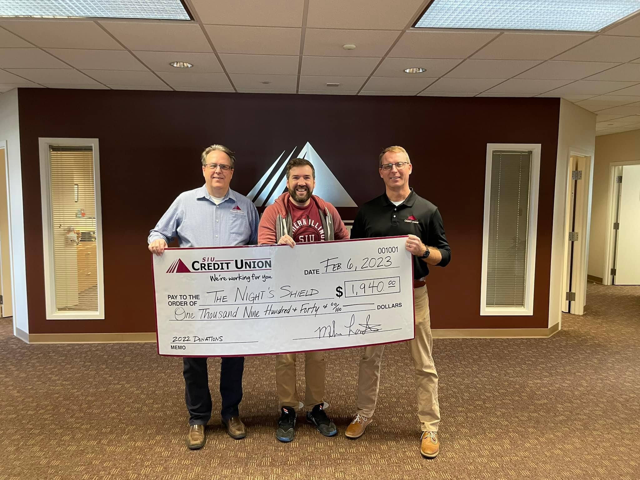 Community donation check presentation